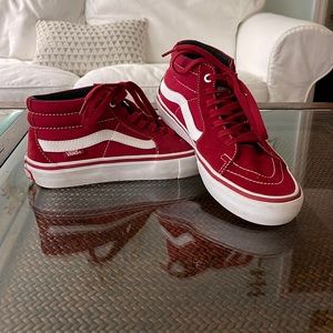 Vans Red with white stripe. Size 7.5 Men. Women size 9.
